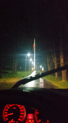 Night driver watches One Piece anime during rainy journey in Bulgaria