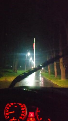 Night driver watches One Piece anime during rainy journey in Bulgaria