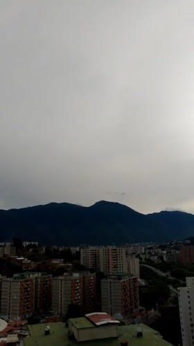 Overcast morning reveals Caracas's dense hillside neighborhoods