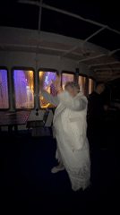 Late-night boat party near a riverside church in Nechkino