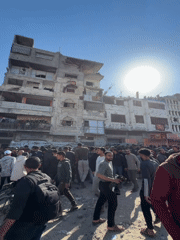 Crowds gather amid building damage, casualties in Gaza City
