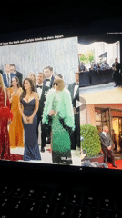 Milan viewer watches livestream of Anna Wintour departing hotel