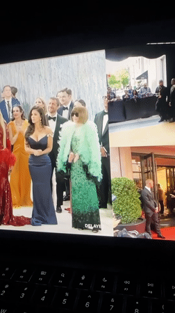Milan viewer watches livestream of Anna Wintour departing hotel