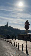 Morning street activity recorded in European town