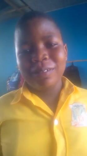 Student records message at school in Ikorodu, Nigeria
