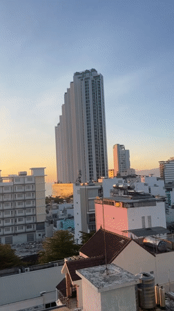 Sunrise captured over Nha Trang cityscape, Vietnam