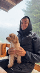 Relaxing on a porch with a fluffy dog in Montenegro