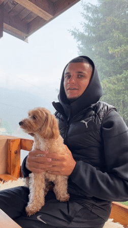 Relaxing on a porch with a fluffy dog in Montenegro