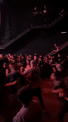 Metal concert rocks Buenos Aires venue with headbanging crowd
