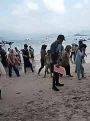 Community beach day at Prigi with water sports and group gathering