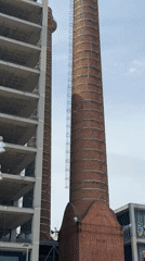Industrial chimneys documented amid Barcelona's mixed development landscape