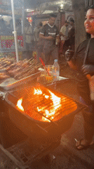Late-night street food stall buzzing in Rio, ambulance nearby