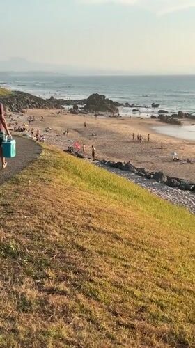 Busy summer evening on Biarritz's beaches at golden hour