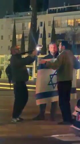 Nighttime demonstration draws crowds to central Tel Aviv locations