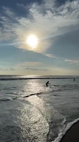 Morning beach scenes captured at Kuta surf spot