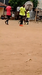 Informal soccer match draws players and spectators in Akwanga