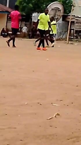 Informal soccer match draws players and spectators in Akwanga