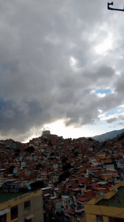 Caracas residents document evening life under dramatic stormy skies