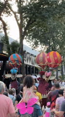 Stilt performers in steampunk hot air balloon costumes take Varna streets
