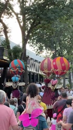Stilt performers in steampunk hot air balloon costumes take Varna streets