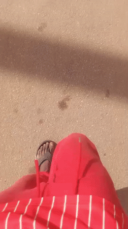 Person walks through Sabon Tasha streets in afternoon