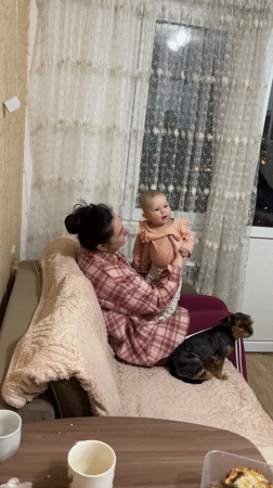 Family cooking and childcare moments captured in Sochi home
