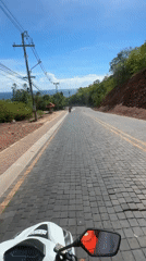 Morning motorcycle ride documented on Pattaya's brick-paved streets