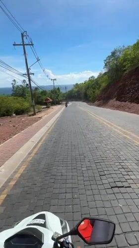 Morning motorcycle ride documented on Pattaya's brick-paved streets