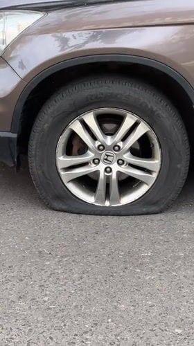 Honda CR-V suffers flat tire in Hrodna, Belarus