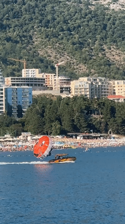 Parasailing behind a motorboat off the Montenegrin coast.