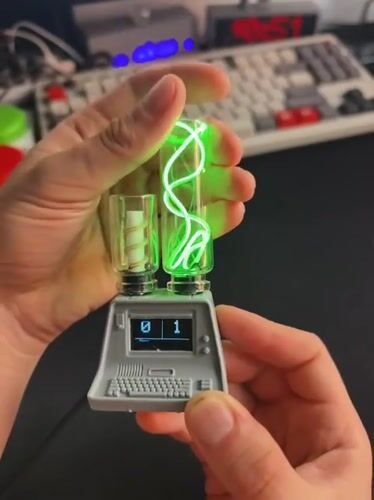 Person holds mysterious electronic device with glass cylinders in Tyumen