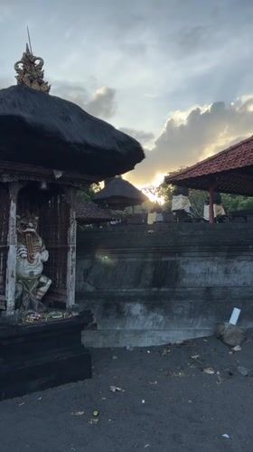 Evening temple visits and beach scenes documented in Kediri