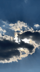 Kazan residents observe clouds and contrails over city landmarks