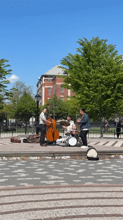 Three-piece band performs outdoor street music in New York