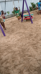 Kids at a Lagos playground, skates on the ground at dusk