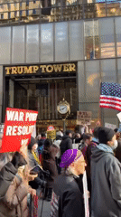 Anti-Trump protesters rally outside Trump Tower with anti-ICE messages