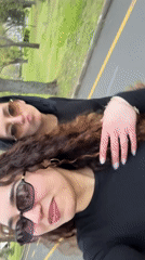 Two women photographed taking selfies in Burgas park