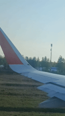 Commercial aircraft conducts takeoff operations at unidentified airport