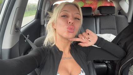 Woman records selfie video from car in Bulgarian village