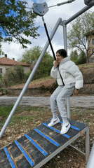 Two people enjoy zipline at Velkovtsi park, Bulgaria