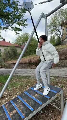 Two people enjoy zipline at Velkovtsi park, Bulgaria