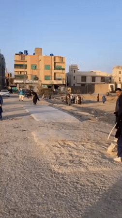 Cricket match played on dirt field in Quetta, Pakistan