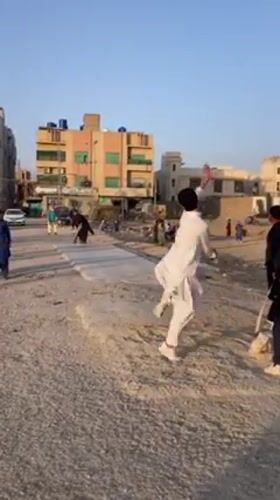 Cricket match played on dirt field in Quetta, Pakistan