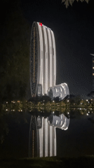 Illuminated Marriott hotel complex reflected in Batumi waters