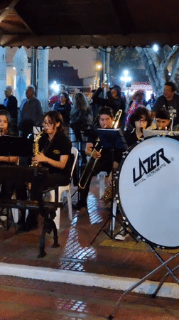 Young musicians perform nighttime outdoor concert in Barranco, Peru