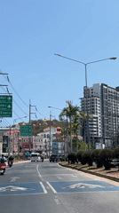 Morning drive captured on sunny Pattaya street