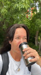 Outdoor hydration moment paired with motivational quotes in Irkutsk