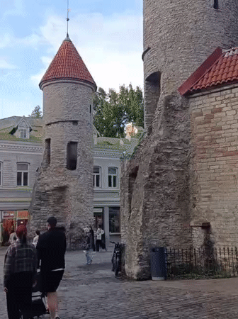 Street snacks and medieval stone at Tallinn's Viru Gate