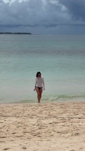 Early morning beach activities documented in Dapa, Philippines