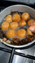 Morning cooking scene documented in Sabon Tasha, Nigeria